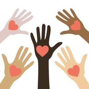 5 hands with different skin tones reached out towards each other